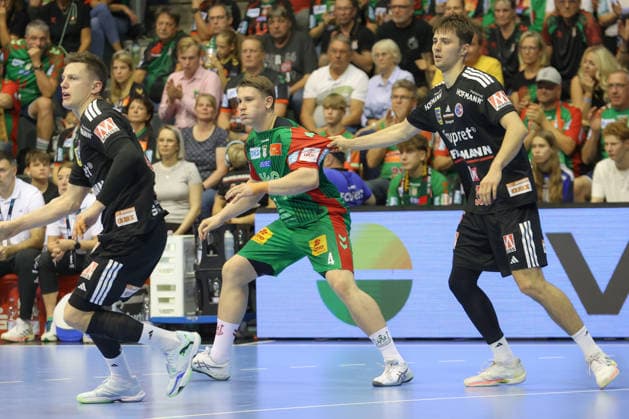 October 4, 2026, xtgx, Opel HBL Handball, SC Magdeburg vs. HC Erlangen, from left: Malte Elze (Magdeburg), 4, Tim Gömmel (Erlangen), 95, one-on-one, duel, battle, tackle, Magdeburg