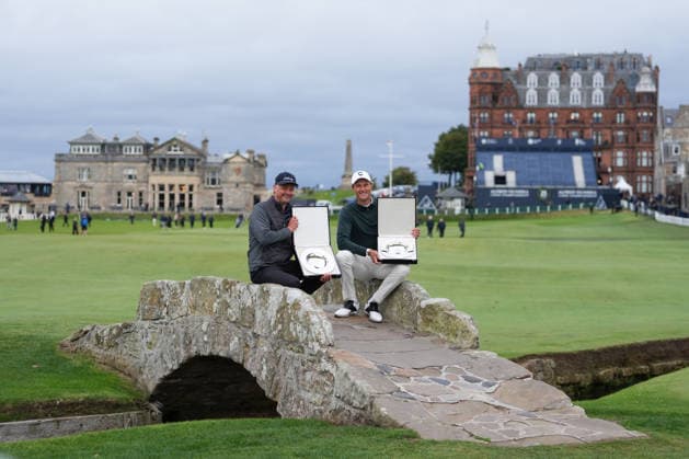 RECORD DATE NOT STATED 4th October 2026; Old Course at St Andrews, St Andrews, Scotland; DP World Tour Golf, Alfred Dunhill Links Championship, Final Day; Tom Chaplin and Adrian Meronk hold the team championship trophy on the Swilcan Bridge AlecxBrown