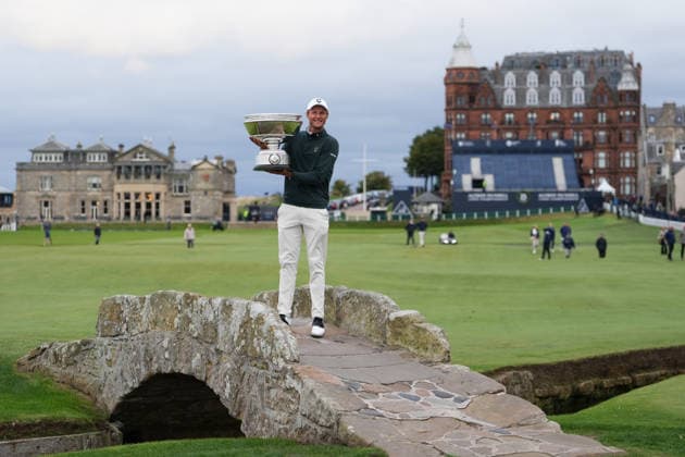 RECORD DATE NOT STATED 4th October 2026; Old Course at St Andrews, St Andrews, Scotland; DP World Tour Golf, Alfred Dunhill Links Championship, Final Day; Adrian Meronk lifts the Alfred Dunhill trophy on the Swilcan Bridge after winning the tournament and becoming champion golfer AlecxBrown