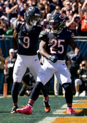 Chicago Bears running back Kyle Monangai (25) celebrates his first quarter touchdown against the New York Jets with Jahdae Walker (9) at Soldier Field in Chicago on Sunday, October 4, 2026.  CHI20261004103 MARKxBLACK