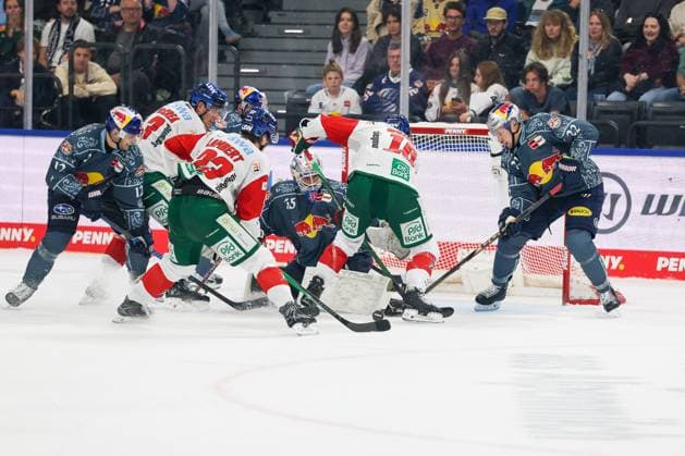 One-on-one, action, featuring Jimmy Lambert 23 of the Augsburg Panthers and Mathias Niederberger 35 of EHC Red Bull Munich, Cameron Wright 16, Augsburg Panthers; Ville Pokka 22, EHC Red Bull Munich; EHC Red Bull Munich vs. Augsburg Panthers, Matchday 6, Ice Hockey, Penny DEL, October 3, 2026, Munich, Bavaria, Germany Copyright: xkolbert-press ChristianxKolbertx