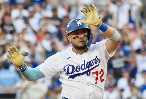 Los Angeles Dodgers Miguel Rojas (72) celebrates on second base after hitting a double against the Atlanta Braves in the third inning in an MLB, Baseball Herren, USA National League Division Series game at Dodger Stadium in Los Angeles, California, on Sunday, October 4, 2026. LAP20261004707 JIMxRUYMEN