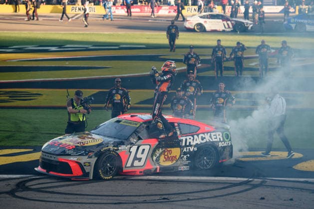 LAS VEGAS, NV - OCTOBER 04: Chase Briscoe ( 19 Joe Gibbs Racing Bass Pro Shops Toyota) climbs on his car to celebrate winning the race during the NASCAR, Motorsport, USA Cup Series Playoffs South Point 400 on October 04, 2026, at Las Vegas Motor Speedway in Las Vegas, NV. (Photo by Chris Williams LVMS Icon Sportswire) AUTO: OCT 04 NASCAR Cup Series Playoffs South Point 400 EDITORIAL USE ONLY Icon0072610041256