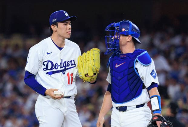 October 4, 2026, Los Angeles, California, USA: Relief pitcher, Roki Sasaki 11 of the Los Angeles Dodgers chats with Will Smith 16 at a NLDS Game 2 against the Atlanta Braves on Sunday October 4, 2026 at Dodger Stadium in Los Angeles, California. JAVIER ROJAS PI Dodgers Vs. Braves NLDS - Game 2 - ZUMAp124 20261004_zaa_p124_006 Copyright: xJavierxRojasx