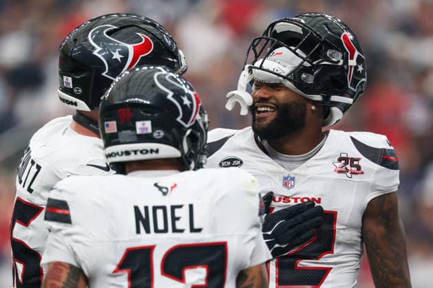 HOUSTON, TX - OCTOBER 04: Wide receiver Nico Collins 12 of the Houston Texans smiles and celebrates with teammates after scoring a touchdown during the NFL, American Football Herren, USA football game between the Houston Texans and Dallas Cowboys on October 4, 2026, at Reliant Stadium in Houston, TX. (Photo by David Buono Icon Sportswire) NFL: OCT 04 Cowboys at Texans EDITORIAL USE ONLY Icon241004191