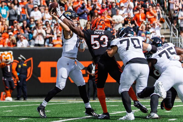 Oct 4, 2026; Cincinnati, OH, USA; Jacksonville Jaguars quarterback Trevor Lawrence (16) is pressured by Cincinnati Bengals defensive lineman Boye Mafe (53) during NFL, American Football Herren, USA game action at Paycor Stadium. Mandatory Credit: -Cal Media - ZUMAc04_ 20261004_zma_c04_511 Copyright: xJohnxMersitsx