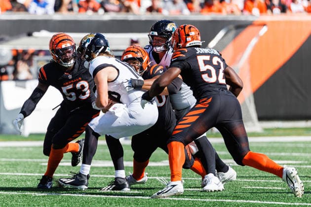 Oct 4, 2026; Cincinnati, OH, USA; Jacksonville Jaguars quarterback Trevor Lawrence (16) is sacked by Cincinnati Bengals defenders during NFL, American Football Herren, USA game action at Paycor Stadium. Mandatory Credit: -Cal Media - ZUMAc04_ 20261004_zma_c04_593 Copyright: xJohnxMersitsx