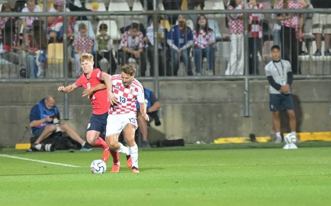 UEFA Nations League League A, Group C, Round 3, 2026–27, soccer match between Croatia and England, Dean Sculac Rujevica Stadium, Rijeka, Croatia, October 3, 2026: Lewis Hall (England, No. 3) competes for the ball with Nikola Vlasic (Croatia, No. 13) during the UEFA Nations League League A, Group C, Round 3, 2026–27, soccer match between Croatia and England at Dean Sculac Rujevica Stadium in Rijeka, Croatia, October 3, 2026 Copyright: xBEAUTIFULxSPORTS Stanusicx
