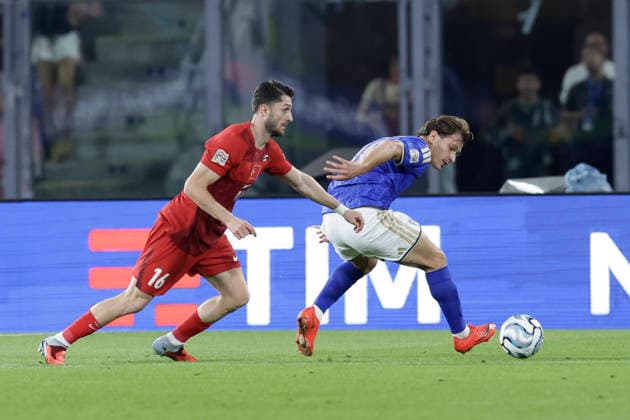 UEFA Nations League football match Italy vs Turkey Ismail Yuksek of Turkiye challenges for the ball with Nicolo Barella of Italy during UEFA Nations League football match (League A, Group A1) between Italy vs Turkey at the Renato Dall Ara stadium in Bologna on October 05, 2026. _BPH2182 Copyright: xAntonioxBalascox