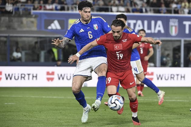 Italy v Turkiye - UEFA Nations League ?????? BOLOGNA, ITALY, OCTOBER 05: Yunus Akgun (R), of Turkiye, is challenged by Alessandro Bastoni (L), of Italy, during the UEFA Nations League Group A1 League phase football match between Italy and Turkiye at the Renato Dall’Ara stadium in Bologna, Italy, on October 05, 2026. Isabella Bonotto Anadolu Bologna Italy. Editorial use only. Please get in touch for any other usage. Copyright: x2026xAnadoluxIsabellaxBonottox