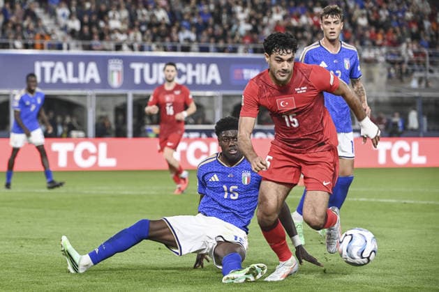 Italy v Turkiye - UEFA Nations League ?????? BOLOGNA, ITALY, OCTOBER 05: Ozan Kabak (R), of Turkiye, is challenged by Issa Doumbia (L), of Italy, during the UEFA Nations League Group A1 League phase football match between Italy and Turkiye at the Renato Dall’Ara stadium in Bologna, Italy, on October 05, 2026. Isabella Bonotto Anadolu Bologna Italy. Editorial use only. Please get in touch for any other usage. Copyright: x2026xAnadoluxIsabellaxBonottox