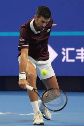 (261006) -- BEIJING, Oct. 6, 2026 -- Novak Djokovic competes during the men s singles semifinal match between Daniil Medvedev of Russia and Novak Djokovic of Serbia at 2026 China Open tennis tournament in Beijing, China, Oct. 5, 2026. ) (SP)CHINA-BEIJING-TENNIS-CHINA OPEN-MEN S SINGLES(CN) XiexHan