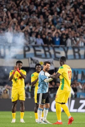BUENOS AIRES, ARGENTINA - OCTOBER 06: Lionel Messi of Argentina (C) is greeted by Mohamed Tijani of Benin (R) and Tamimou Ouorou of Benin (L) during the International Friendly, Länderspiel, Nationalmannschaft football match between Argentina and Benin at Estadio Monumental Antonio V. Liberti on October 06, 2026 in Buenos Aires, Argentina. (Photo by Richard Callis Sports Press Photo) Copyright: xRichardxCallis SportsxPressxPhotox Sportspressphoto_SPR247809