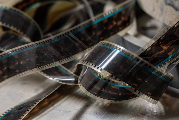 Vorführraum des Kinos Bambi mit Projektor und Filmrollen Vorführraum des Kinos Bambi mit Projektor und Filmrollen ,property released Copyright: xZoonar.com wolfgangxcezannex 21626515 ,model released, Symbolfoto ,property released