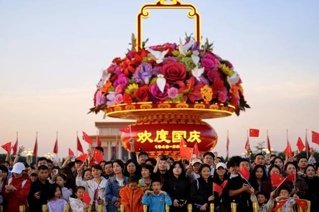 (251001) -- BEIJING, Oct. 1, 2025 -- People attend a flag-raising ceremony marking the 76th anniversary of the founding of the People s Republic of China at Tian anmen Square in Beijing, capital of China, Oct. 1, 2025. ) CHINA-BEIJING-NATIONAL DAY-FLAG-RAISING CEREMONY (CN) XingxGuangli
