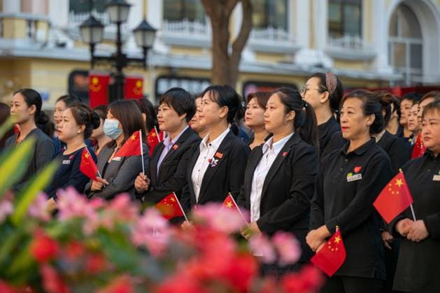 (251001) -- BEIJING, Oct. 1, 2025 -- People attend a flag-raising ceremony in Harbin, northeast China s Heilongjiang Province, Oct. 1, 2025. The 76th anniversary of the founding of the People s Republic of China was observed on Wednesday in various ways across the country. ) CHINA-NATIONAL DAY-CELEBRATION (CN) ZhangxTao