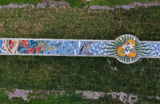 October 13, 2025, St. Petersburg, Florida, USA: An aerial drone view of The Sunshine City Mosaic sidewalk mural at Sunset Park, 7340 Central Ave, on Monday, Oct. 13, 2025 in St. Petersburg. The 175 foot long side walk mural is the largest in the Southeast. St. Petersburg USA - ZUMAs70_ 20251013_zan_s70_048 Copyright: xDirkxShaddx