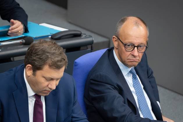 Federal Chancellor Friedrich Merz on the right with his Finance Minister and Vice Chancellor Lars Klingbeil on the government bench in the German Bundestag Session day 23 09 2025 in the German Bundestag , Berlin Berlin Germany Reichstag building