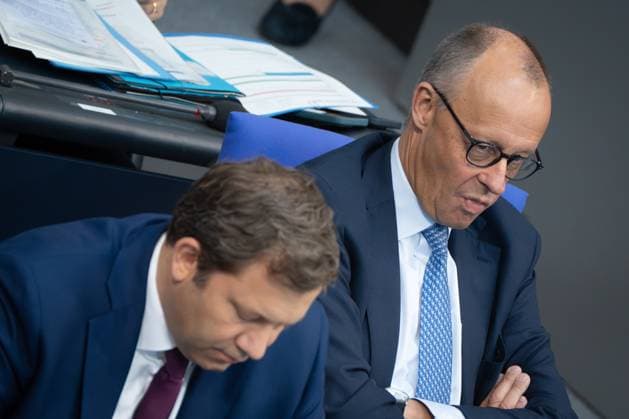 Federal Chancellor Friedrich Merz on the right with his Finance Minister and Vice Chancellor Lars Klingbeil on the government bench in the German Bundestag Session day 23 09 2025 in the German Bundestag , Berlin Berlin Germany Reichstag building