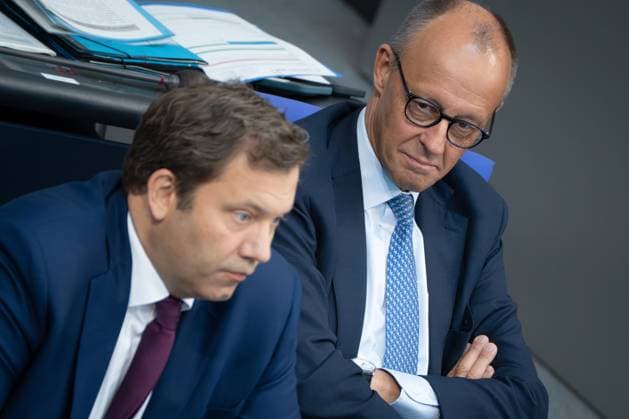 Federal Chancellor Friedrich Merz on the right with his Finance Minister and Vice Chancellor Lars Klingbeil on the government bench in the German Bundestag Session day 23 09 2025 in the German Bundestag , Berlin Berlin Germany Reichstag building