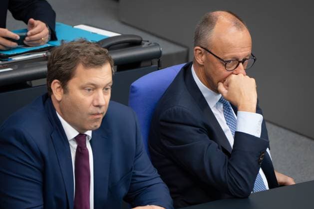 Federal Chancellor Friedrich Merz on the right with his Finance Minister and Vice Chancellor Lars Klingbeil on the government bench in the German Bundestag Session day 23 09 2025 in the German Bundestag , Berlin Berlin Germany Reichstag building