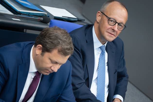 Federal Chancellor Friedrich Merz on the right with his Finance Minister and Vice Chancellor Lars Klingbeil on the government bench in the German Bundestag Session day 23 09 2025 in the German Bundestag , Berlin Berlin Germany Reichstag building