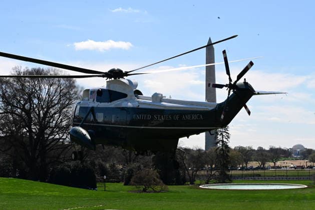 President Donald Trump Departs The White House (INT) President Donald Trump gestures a wave as he departs the White House with United States Secretary of War Pete Hegseth and United States Chairman of the Joint Chiefs of Staff Dan Caine in Washington, D.C., on March 18, 2026 for a trip to Dover Air Force Base for a dignified transfer where the remains of six U.S. service members killed in the crash of a refueling aircraft are returned to their families. It will be the second time since launching the war with Iran on Feb. 28 that the Republican president will attend the solemn military ritual known as a dignified transfer, which he once described as the toughest thing he has had to do as commander in chief. Credit: Kyle Mazza Thenews2  Copyright: xKylexMazzax