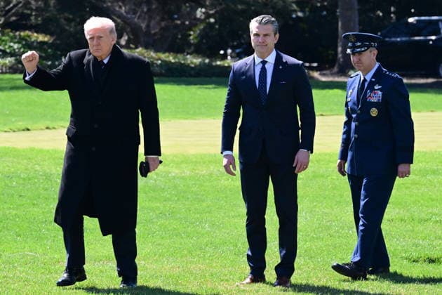 President Donald Trump Departs The White House (INT) President Donald Trump gestures a fist bump as he departs the White House with United States Secretary of War Pete Hegseth and United States Chairman of the Joint Chiefs of Staff Dan Caine in Washington, D.C., on March 18, 2026 for a trip to Dover Air Force Base for a dignified transfer where the remains of six U.S. service members killed in the crash of a refueling aircraft are returned to their families. It will be the second time since launching the war with Iran on Feb. 28 that the Republican president will attend the solemn military ritual known as a dignified transfer, which he once described as the toughest thing he has had to do as commander in chief. Credit: Kyle Mazza Then  Copyright: xKylexMazzax