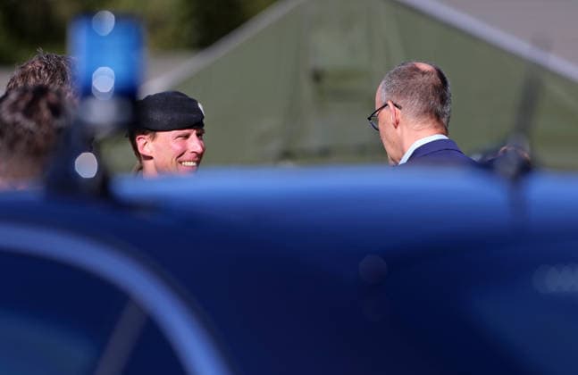 Federal Chancellor Friedrich Merz, right, is greeted by the Inspector of the Army, Lieutenant General Dr Christian Freuding, left, during his visit to Munster Federal Chancellor Friedrich Merz, right, is greeted by the Inspector of the Army, Lieutenant General Dr Christian Freuding, left, during his visit to Munster Munster Lower Saxony Germany