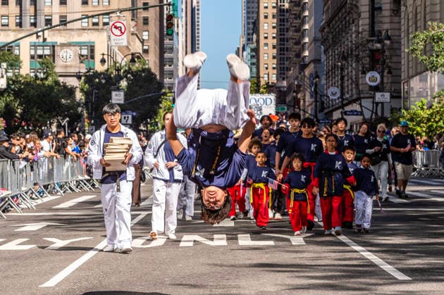 October 3, 2026, New York, New York, USA: A participant at the 2026 NYC Korean Parade does a flip while marching down Sixth Avenue. New York USA - ZUMAh214 20261003_znp_h214_044 Copyright: xSDxHerzogx