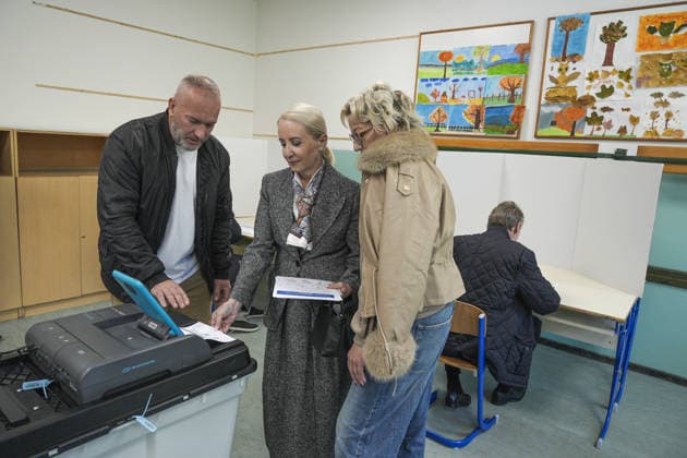 Bakir Izetbegovic casts his vote in Sarajevo SARAJEVO, BOSNIA AND HERZEGOVINA - OCTOBER 4: Bakir Izetbegovic (R), President of the Party of Democratic Action (SDA) and a candidate for the Presidency of Bosnia and Herzegovina, casts his vote accompanied by his wife, Sebija Izetbegovic (2nd L), at the polling station located at Nafija Sarajlic Elementary School in Sarajevo, Bosnia and Herzegovina, on October 4, 2026. Samir Jordamovic Anadolu Sarajevo Bosnia and Herzegovina. Editorial use only. Please get in touch for any other usage. Copyright: x2026xAnadoluxSamirxJordamovicx