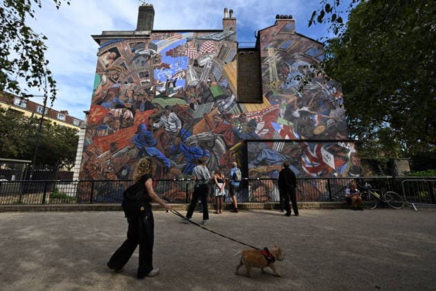 October 4, 2026, London, London, UK: London, UK. A view of The Cable Street Mural on this day marking the 90th anniversary of The Battle of Cable Street created by Dave Binnington, Paul Butler, Ray Walker, and Desmond Rochfort during the years 1979 to 1983, it serves as a tribute to the historic events of the Battle of Cable Street in 1936. London UK  - ZUMAl94_ 20261004_zaf_l94_064 Copyright: xRayxTangx