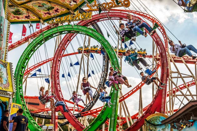 Farewell to the Wiesn: Festivalgoers soar through the Bavarian sky on the Wiellenflug cha