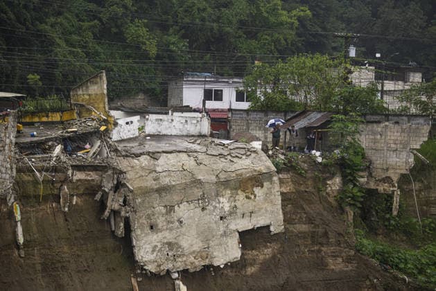 Heavy rains linked to El Nino trigger severe land collapse in Guatemala SAN MIGUEL PETAPA, GUATEMALA - OCTOBER 04: The Pinula River surges following relentless rainfall linked to the El Nino phenomenon, triggering severe erosion and the collapse of homes in the Villa Hermosa I neighborhood of San Miguel Petapa, Guatemala on October 04, 2026. Official reports indicate extensive structural damage and continuous land loss, exacerbating years of riverbank erosion and placing neighboring residential properties at critical risk as heavy precipitation and scouring persist. Luis Vargas Anadolu San Miguel Petapa Guatemala. Editorial use only. Please get in touch for any other usage. Copyright: x2026xAnadoluxLuisxVargasx