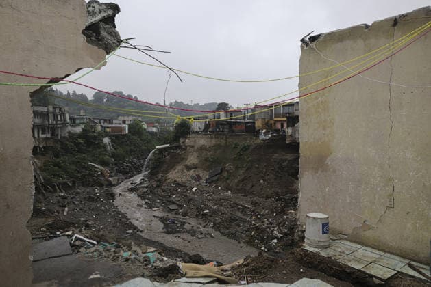 Heavy rains linked to El Nino trigger severe land collapse in Guatemala SAN MIGUEL PETAPA, GUATEMALA - OCTOBER 04: The Pinula River surges following relentless rainfall linked to the El Nino phenomenon, triggering severe erosion and the collapse of homes in the Villa Hermosa I neighborhood of San Miguel Petapa, Guatemala on October 04, 2026. Official reports indicate extensive structural damage and continuous land loss, exacerbating years of riverbank erosion and placing neighboring residential properties at critical risk as heavy precipitation and scouring persist. Luis Vargas Anadolu San Miguel Petapa Guatemala. Editorial use only. Please get in touch for any other usage. Copyright: x2026xAnadoluxLuisxVargasx