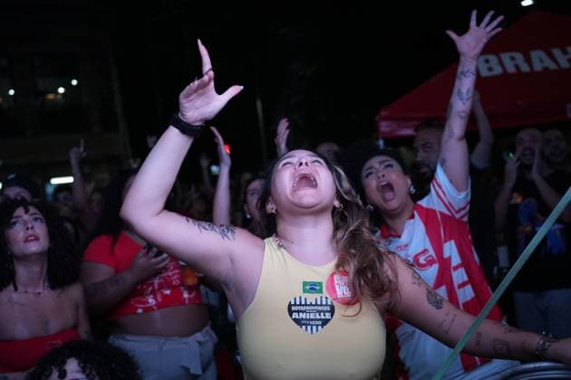 October 4, 2026, Rio De Janeiro, Brazil: RIO DE JANEIRO, BRAZIL, OCTOBER 4, 2026: Supporters of Brazilian President Luiz Inacio Lula da Silva gather in Rio de Janeiro to follow the results of the first round of Brazil s presidential election. Senator Flavio Bolsonaro finished first with 47.03 percent of valid votes, while Lula received 45.16 percent, sending the presidential race to a runoff after neither candidate secured an outright majority. The second round is scheduled for October 25 Rio De Janeiro Brazil - ZUMAq101 20261004_zna_q101_166 Copyright: xMarianaxGreifx