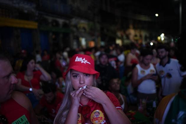 October 4, 2026, Rio De Janeiro, Brazil: RIO DE JANEIRO, BRAZIL, OCTOBER 4, 2026: Supporters of Brazilian President Luiz Inacio Lula da Silva gather in Rio de Janeiro to follow the results of the first round of Brazil s presidential election. Senator Flavio Bolsonaro finished first with 47.03 percent of valid votes, while Lula received 45.16 percent, sending the presidential race to a runoff after neither candidate secured an outright majority. The second round is scheduled for October 25 Rio De Janeiro Brazil - ZUMAq101 20261004_zna_q101_169 Copyright: xMarianaxGreifx