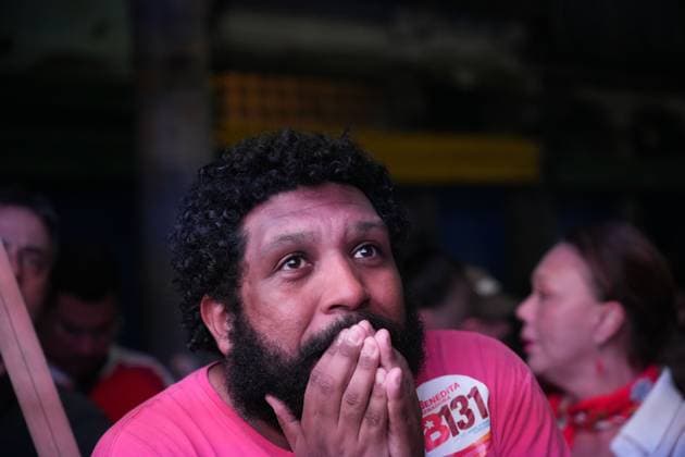 October 4, 2026, Rio De Janeiro, Brazil: RIO DE JANEIRO, BRAZIL, OCTOBER 4, 2026: Supporters of Brazilian President Luiz Inacio Lula da Silva gather in Rio de Janeiro to follow the results of the first round of Brazil s presidential election. Senator Flavio Bolsonaro finished first with 47.03 percent of valid votes, while Lula received 45.16 percent, sending the presidential race to a runoff after neither candidate secured an outright majority. The second round is scheduled for October 25 Rio De Janeiro Brazil - ZUMAq101 20261004_zna_q101_173 Copyright: xMarianaxGreifx
