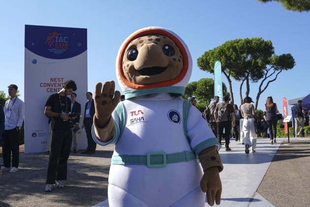 World’s largest annual gathering dedicated to space opens in Turkiye’s Antalya ANTALYA, TURKIYE - OCTOBER 05: Turquoise, the official Caretta caretta mascot of the 77th International Astronautical Congress (IAC), interacts with delegates during the opening day of the global summit at the NEST Convention Center in Antalya, Turkiye on October 05, 2026. Organized by the International Astronautical Federation (IAF), coordinated by the Turkish Ministry of Industry and Technology, and co-hosted by the Turkish Space Agency (TUA) and SAHA Istanbul, the event features the mascot welcoming space professionals and attendees from around the world. Beyza Comert Anadolu Antalya Turkey. Editorial use only. Please get in touch for any other usage. Copyright: x2026xAnadoluxBeyzaxComertx