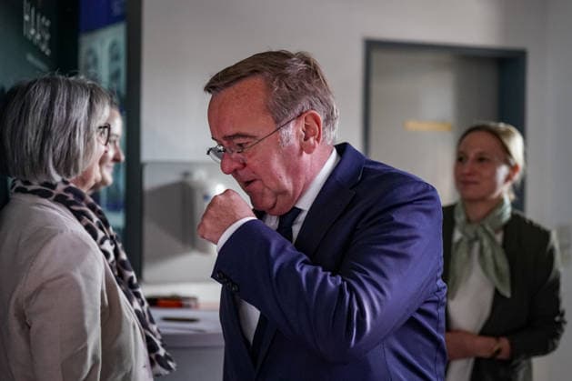 Germany, Emden: Federal Minister of Defense Boris Pistorius coughs into his fist on the sidelines of a press conference regarding the decision on a second naval base for the German Navy on the North Sea coast. Emden will be the site of the new naval base. Boris Pistorius, coughing, gesture, snapshot, portrait, Federal Min Copyright: xJOERANxSTEINSIEKx