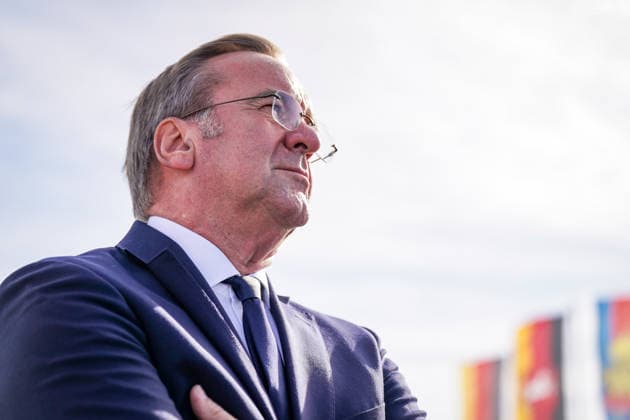 Germany, Emden: Federal Minister of Defense Boris Pistorius gazes into the distance during a press conference on the decision regarding the German Navy’s new naval base in Emden. Flags are visible in the background. Portrait, side profile, low-angle shot, Boris Pistorius, Federal Minister of Defense, Federa Copyright: xJOERANxSTEINSIEKx