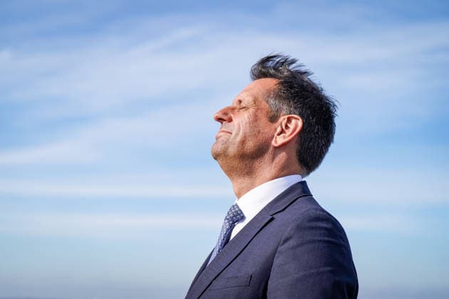 Germany, Emden: Lower Saxony’s Minister President Olaf Lies closes his eyes to enjoy a moment in the sun during a press event regarding the decision on the German Navy’s new naval base in Emden. Portrait, side profile, Olaf Lies, Minister-President, Lower Saxony, state government, German Navy, Bundeswehr, naval base, location decision, Em Copyright: xJOERANxSTEINSIEKx