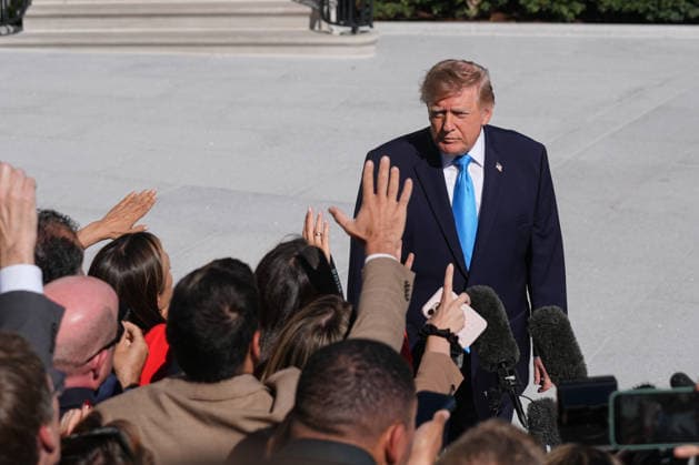 President Trump departs White House for Nebraska midterm campaign rally WASHINGTON, D.C., UNITED STATES - OCTOBER 05: U.S. President Donald Trump speaks to press members before boarding Marine One on the South Lawn of the White House in Washington, D.C., on October 5, 2026. Trump is traveling to Nebraska to attend a midterm campaign rally. Mehmet Eser Anadolu Washington United States. Editorial use only. Please get in touch for any other usage. Copyright: x2026xAnadoluxMehmetxEserx
