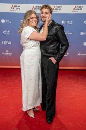 ABB FIRSTSTEPS: Gisa Flake and Knud Riepen walk the red carpet at the 2026 FIRST STEPS Awards ceremony at the Theater des Westens on October 5, 2026, in Berlin, Germany