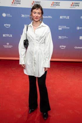 ABB FIRSTSTEPS: Linda Belinda Podszus walks the red carpet at the 2026 FIRST STEPS Awards ceremony at the Theater des Westens on October 5, 2026, in Berlin, Germany