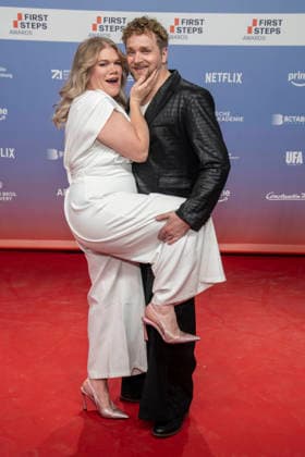 ABB FIRSTSTEPS: Gisa Flake and Knud Riepen walk the red carpet at the 2026 FIRST STEPS Awards ceremony at the Theater des Westens on October 5, 2026, in Berlin, Germany