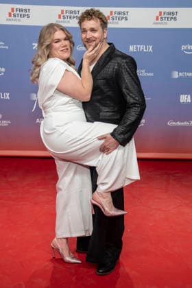 ABB FIRSTSTEPS: Gisa Flake and Knud Riepen walk the red carpet at the 2026 FIRST STEPS Awards ceremony at the Theater des Westens on October 5, 2026, in Berlin, Germany