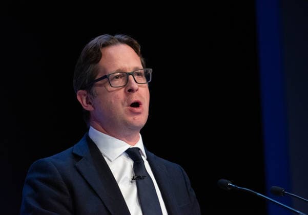 October 6, 2026, Birmingham, United Kingdom: Alex Burghart Shadow Secretary of State for Northern Ireland addresses the audience. The session Defending Britain in a More Dangerous World took place on the main stage at the Conservative Party Conference at the ICC Birmingham. It featured key shadow cabinet figures including Tom Tugendhat, Helen Whately , James Cartlidge, and Alex Burghart , as well as a performance by St Mary s Ukrainian School choir. They were also joined by Yehor Cherniev, Ukrainian MP and Professor Niall Ferguson Birmingham United Kingdom - ZUMAs197 20261006_aaa_s197_117 Copyright: xGaryxRobertsx
