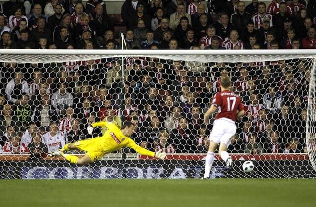 Mandatory Credit: Photo by Back Page Images Shutterstock (1225673e) Stoke City goalkeeper Thomas Sorensen fails to stop Stewart Downing of Aston Villa (not pictured) from scoring the opening goal of the game Stoke City v Aston Villa, FA Premier League football match, Britannia Stadium, Britain - 13 Sep 2010 Stoke beat Villa 2-1 EDITORIAL USE ONLY No use with unauthorised audio, video, data, fixture lists (outside the EU), club league logos or live services. Online in-match use limited to 45 images (+15 in extra time). No use to emulate moving images. No use in betting, games or single club league player publications services. Stoke City v Aston Villa, FA Premier League football match, Britannia Stadium, Britain - 13 Sep 2010 EDITORIAL USE ONLY No use with unauthorised audio, video, data, fixture lists (outside the EU), club league logos or live services. Online in-match use limited to 45 images (+15 in extra time). No use to emulate moving images. No use in betting, games or Copyright: xBackxPagexImages Shutterstockx 1225673e