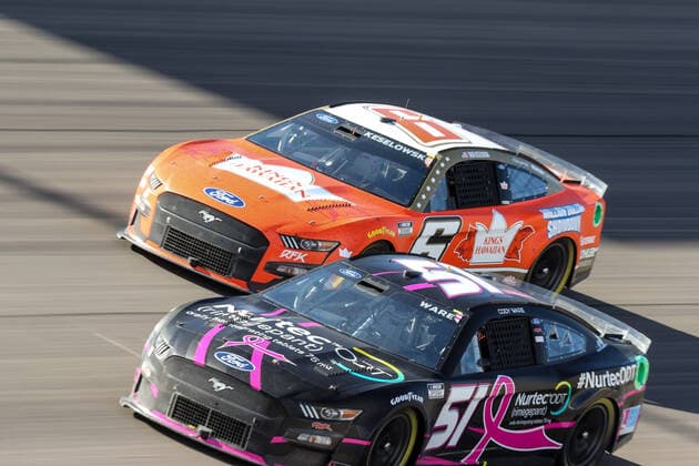 LAS VEGAS, NV - OCTOBER 16: Brad Keselowski ( 6 RFK Racing King s Hawaiian Ford) and Cody Ware ( 51 Rick Ware Racing Nurtec ODT UBCF Ford) battle for position during the NASCAR, Motorsport, USA Cup Series Playoff South Point 400, on October 16, 2022, at Las Vegas Motor Speedway in Las Vegas, NV.(Photo by Christopher Trim Icon Sportswire) AUTO: OCT 16 NASCAR Cup Series Playoff South Point 400 Icon221016044400